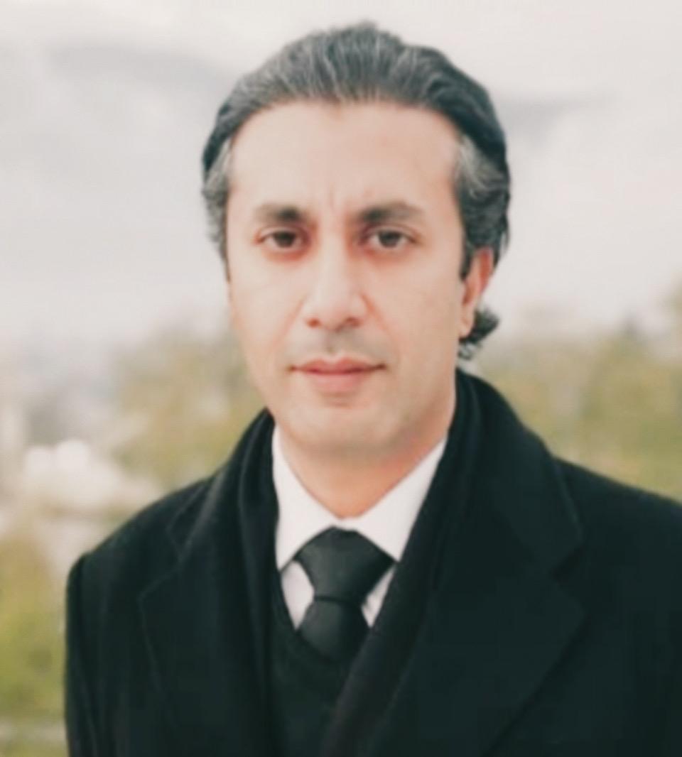 Portrait of Malik Waqas Ali, Senior Partner at Ali & Tayyaba Law Firm